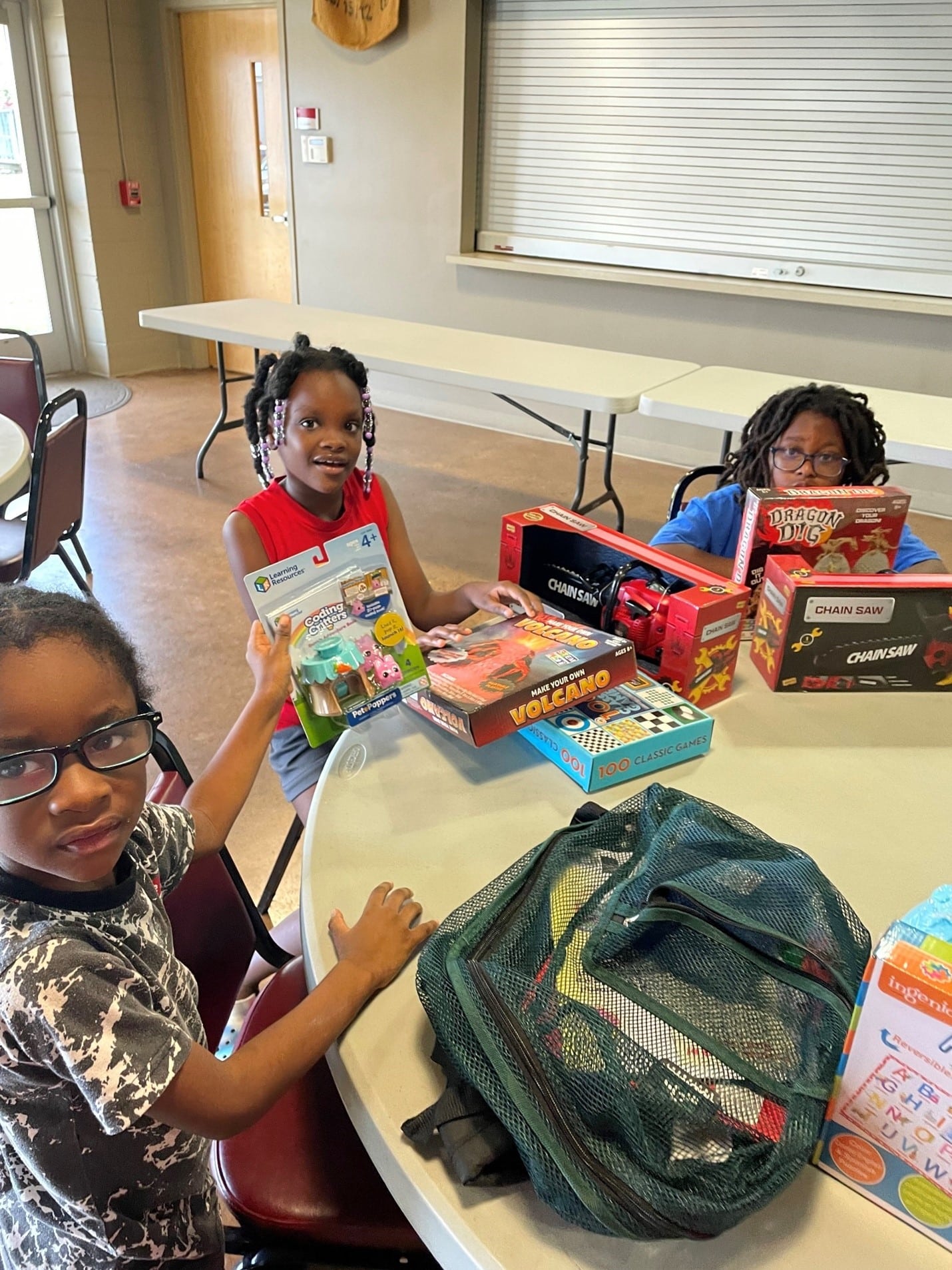 Children in Tuscaloosa Surprised with New Backpacks and Toys!